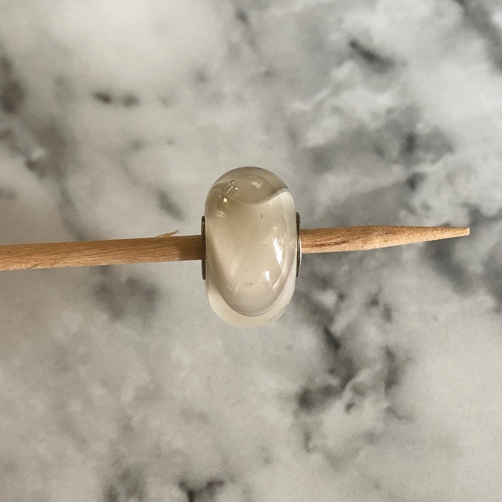 Cream glass armadillo glass charm
